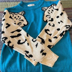 Angashion snow leopard sweater. Size M.